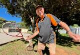 Bill Newton takes a few practice swings at his home in Gulgong. Photo: Benjamin Palmer