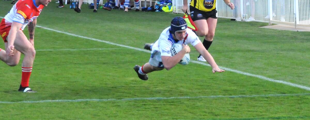 Parkes' Ryan Goodsell, pictured scoring against Mudgee last year, scored three tries on Sunday. Picture by Tom Barber
