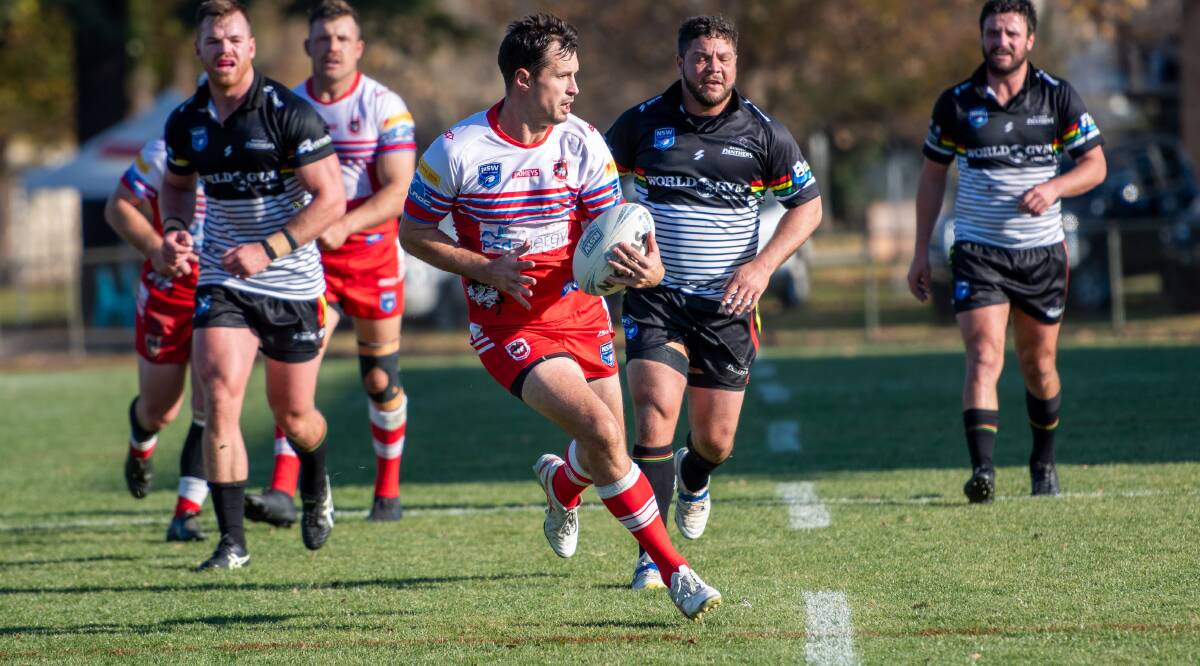 Mudgee's Jack Littlejohn takes a run during his side's win. Picture by James Arrow 