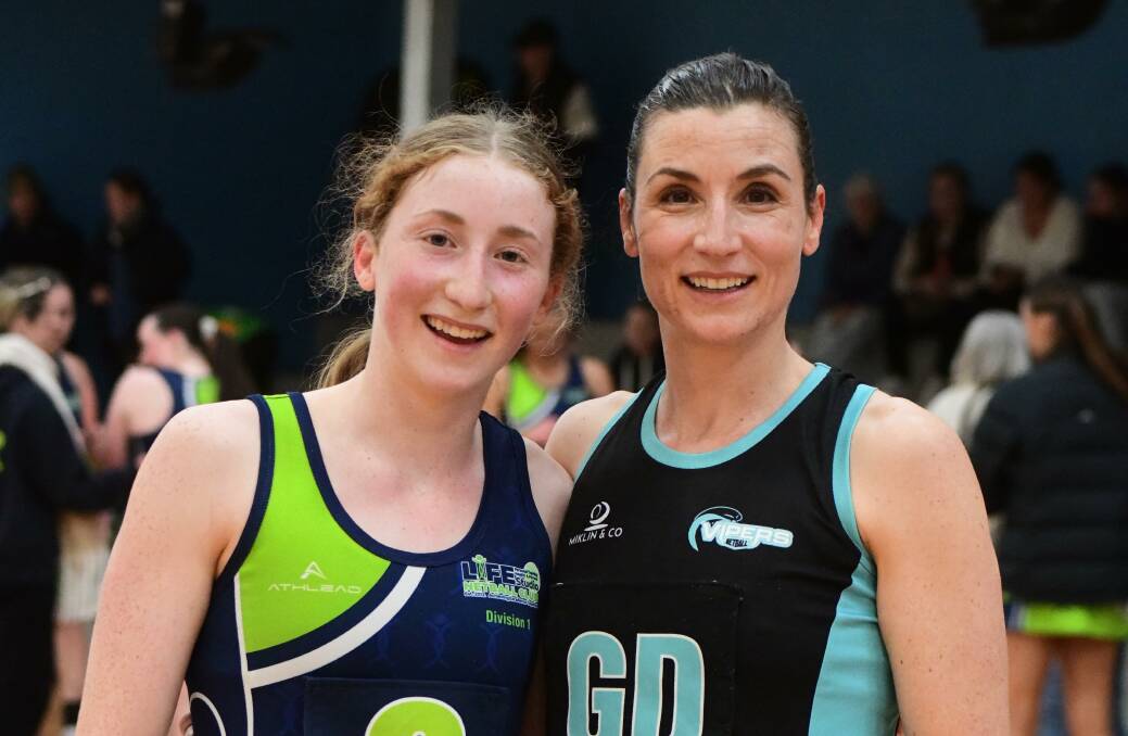 Grace and Suz Simpson ready to face each other in the Orange Netball Association division one competition. Picture by Jude Keogh
