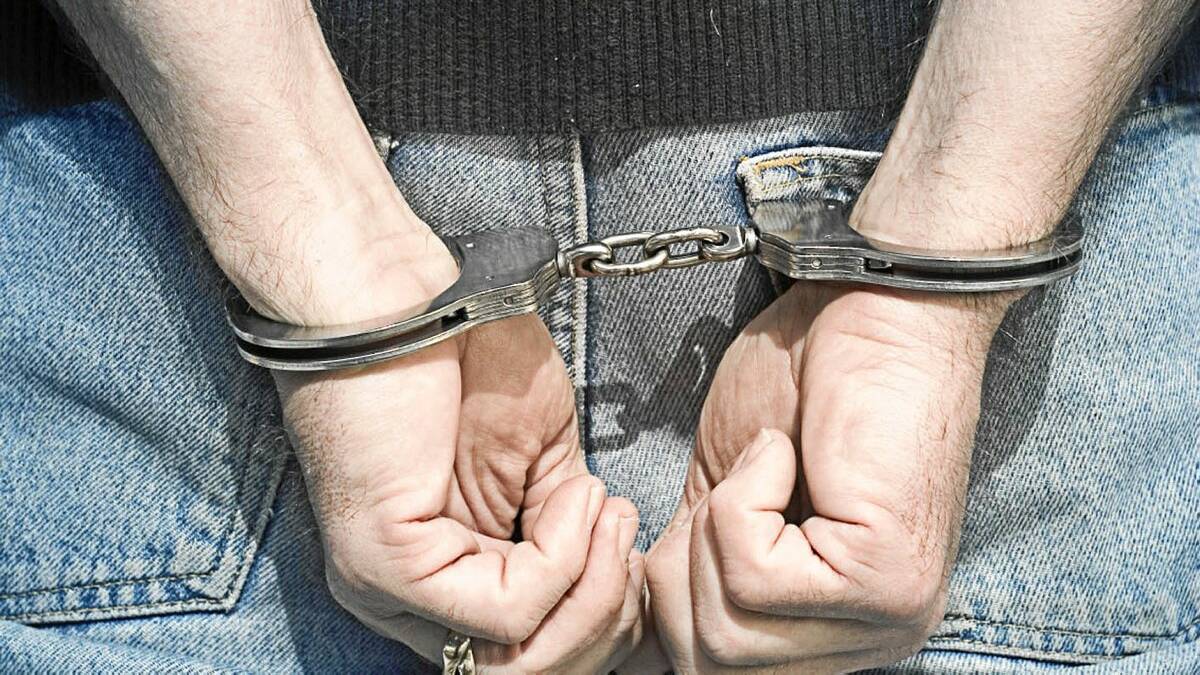 A man in handcuffs. File photo