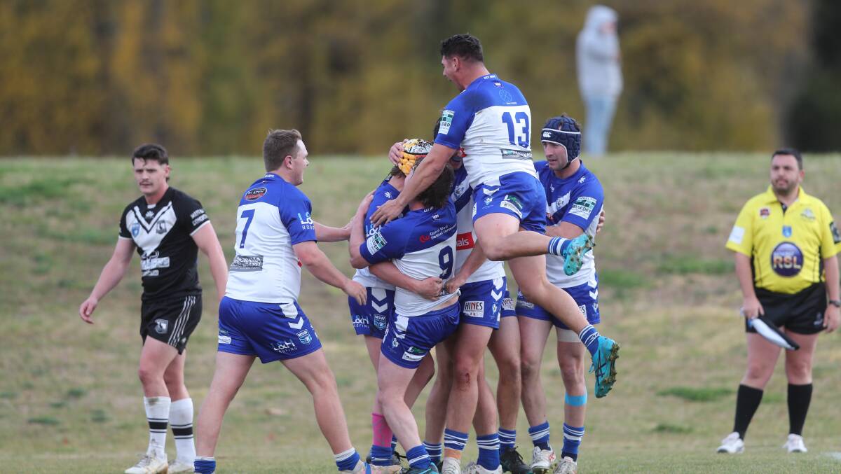 St Pat's players celebrate Lochlan Randall's first try of the day. Picture by Phil Blatch.