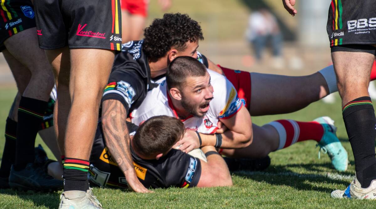 Zac Saddler crashes over for one of his two tries in the Mudgee Dragons' win over Bathurst Panthers. Picture by James Arrow