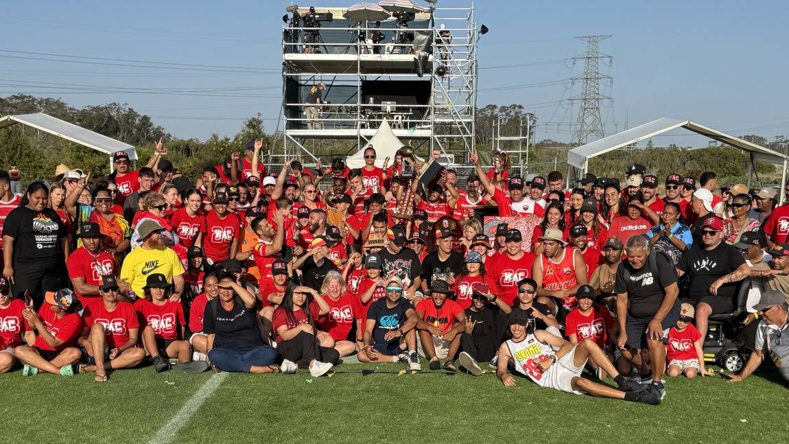 Walgett players, families and supporters celebrate after winning the 2023 Koori Knockout on Monday. Picture supplied