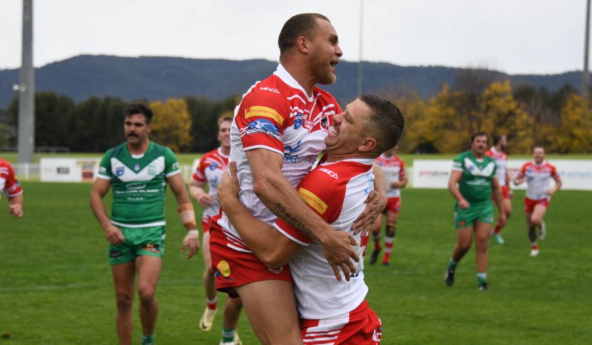 Ethan Pegus (left) celebrates a try with Camden Sutton during Mudgee's dominant win over Dubbo CYMS. Picture by Nick Guthrie