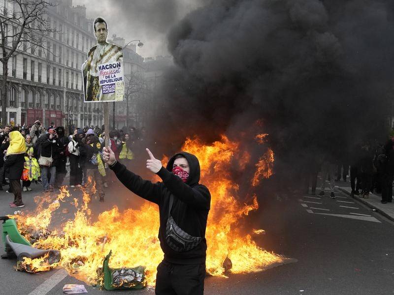 As protests flare across France, the government remains unmoved on its proposed pension changes. (AP PHOTO)