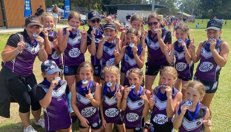 CHAMPIONS: Erin Perini and her dominant under 12s side at Nelsons Bay. Photo: Submitted