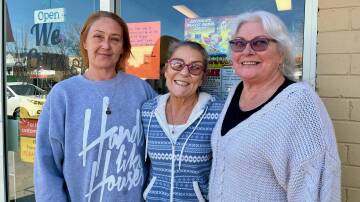 Kylie Collins, Karenne Roest and Liana Moore outside the We Care Community Shop in its final days on Wednesday, July 24 2024. Picture by Benjamin Palmer