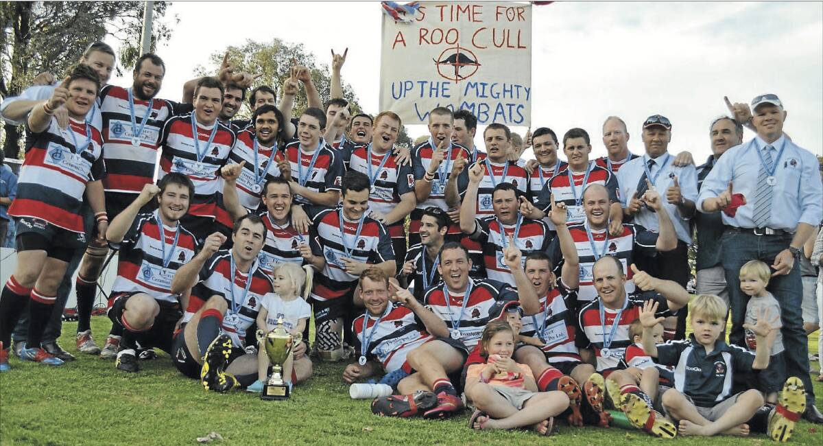 FLASHBACK: Mudgee Wombats players celebrate their 29-26 win over Coolah in the Australian National Field Days northern conference at Bowen Oval in 2013. Photo: Ben Harris