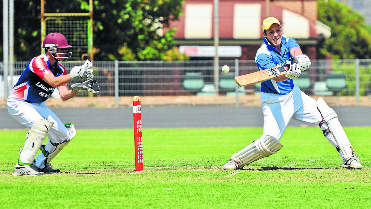 CUT AWAY: Woolpack Hotel’s Daniel Hiep tries to get the ball away. Photo: SANDY SMITH 060113sscritwenty0298