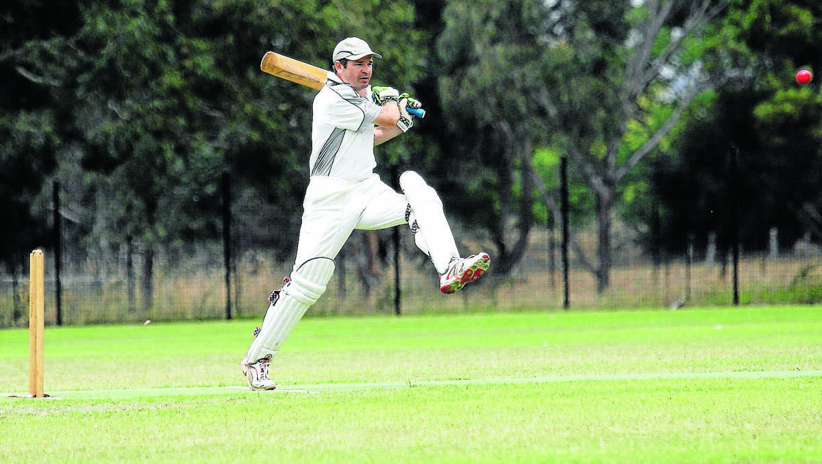 GOING DOWN SWINGING: Centennial Hotel’s Tim Papworth scored a century for his side but it wasn’t enough as Stuart Bromley’s 203 not out led Post Office Hotel to a famous victory. Photo: DAVID DONOVAN 	130113ddgulgcrick1440
